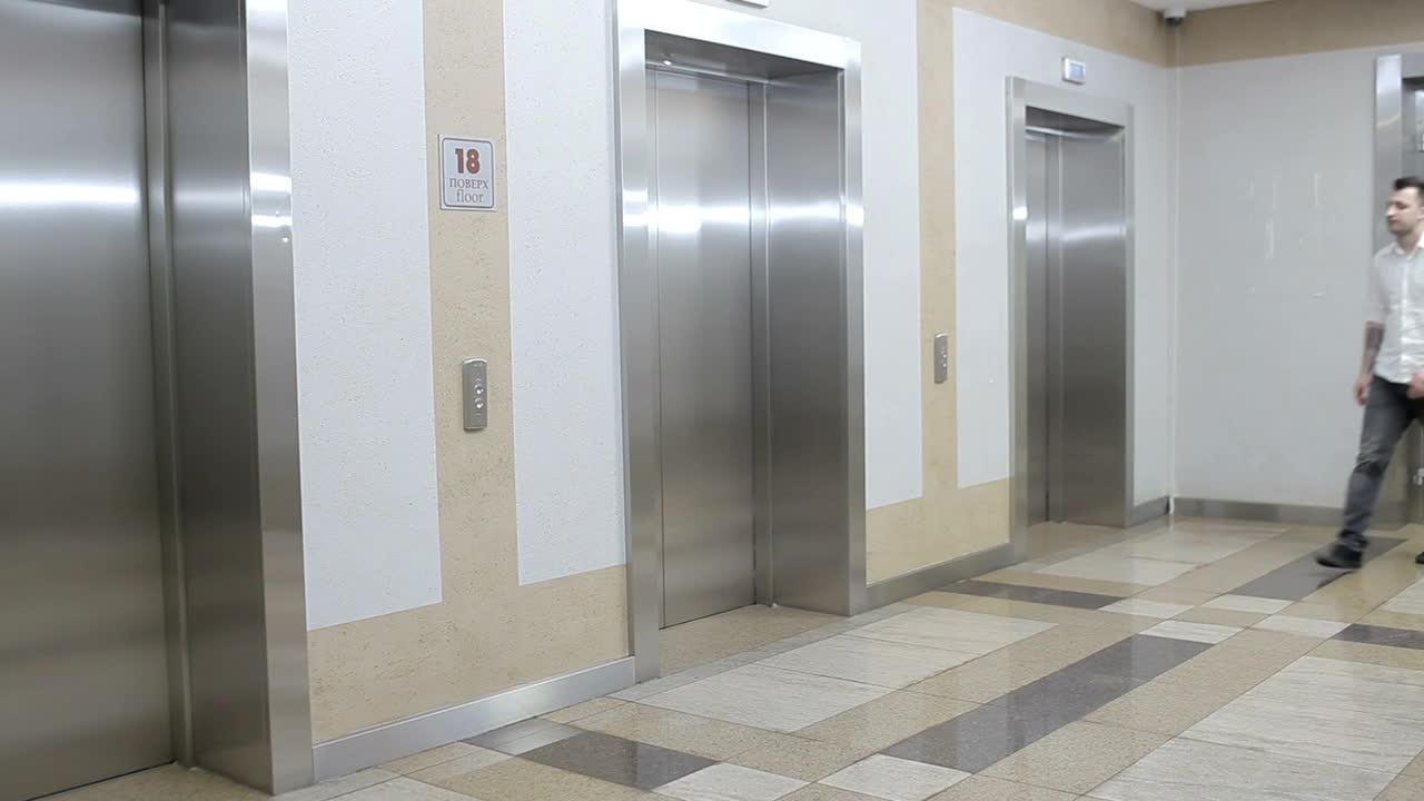 Stock Video Man Tries Broken Elevator Button In Offic Animated Wallpaper