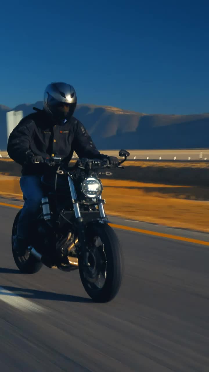 Stock Video Man Traveling Fast By Motorcycle On A Roa Animated Wallpaper