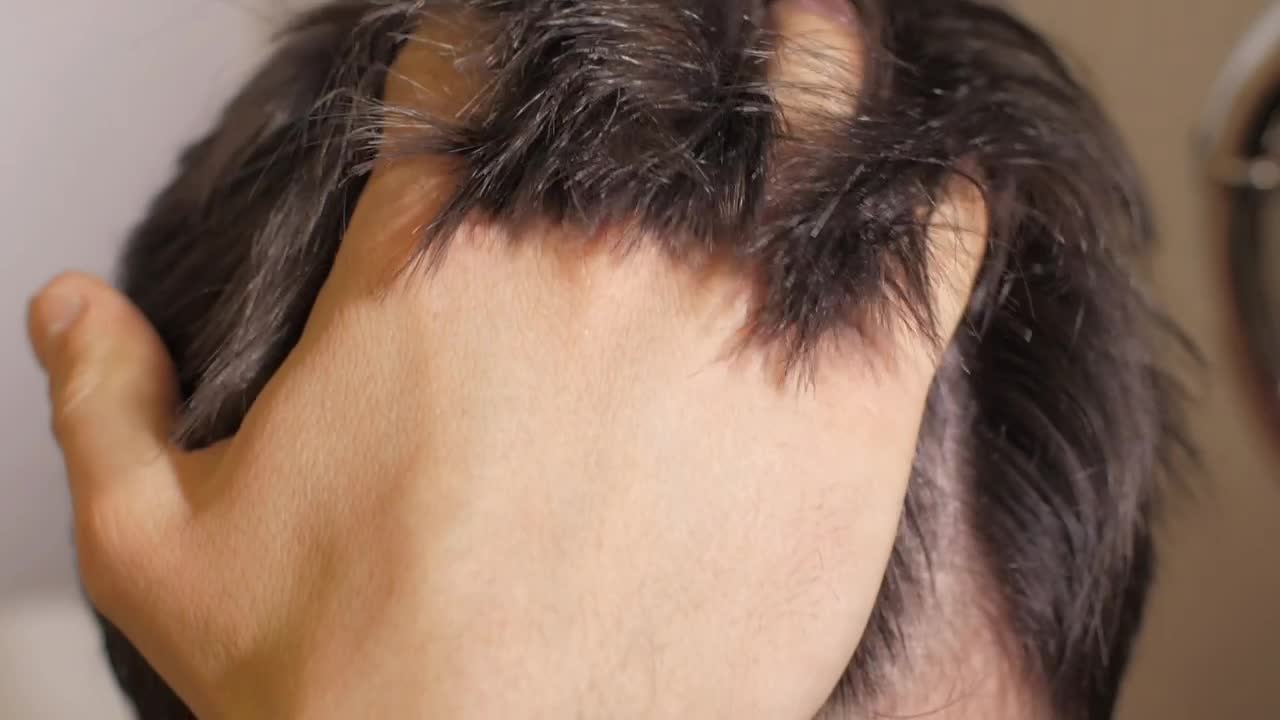 Stock Video Man Touching His Hair Close U Animated Wallpaper