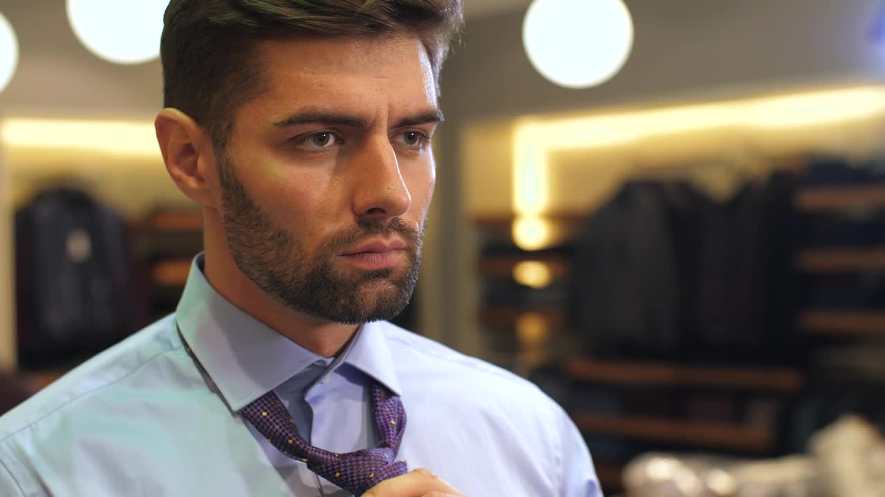 Stock Video Man Ties His Tie In Suit Sho Animated Wallpaper