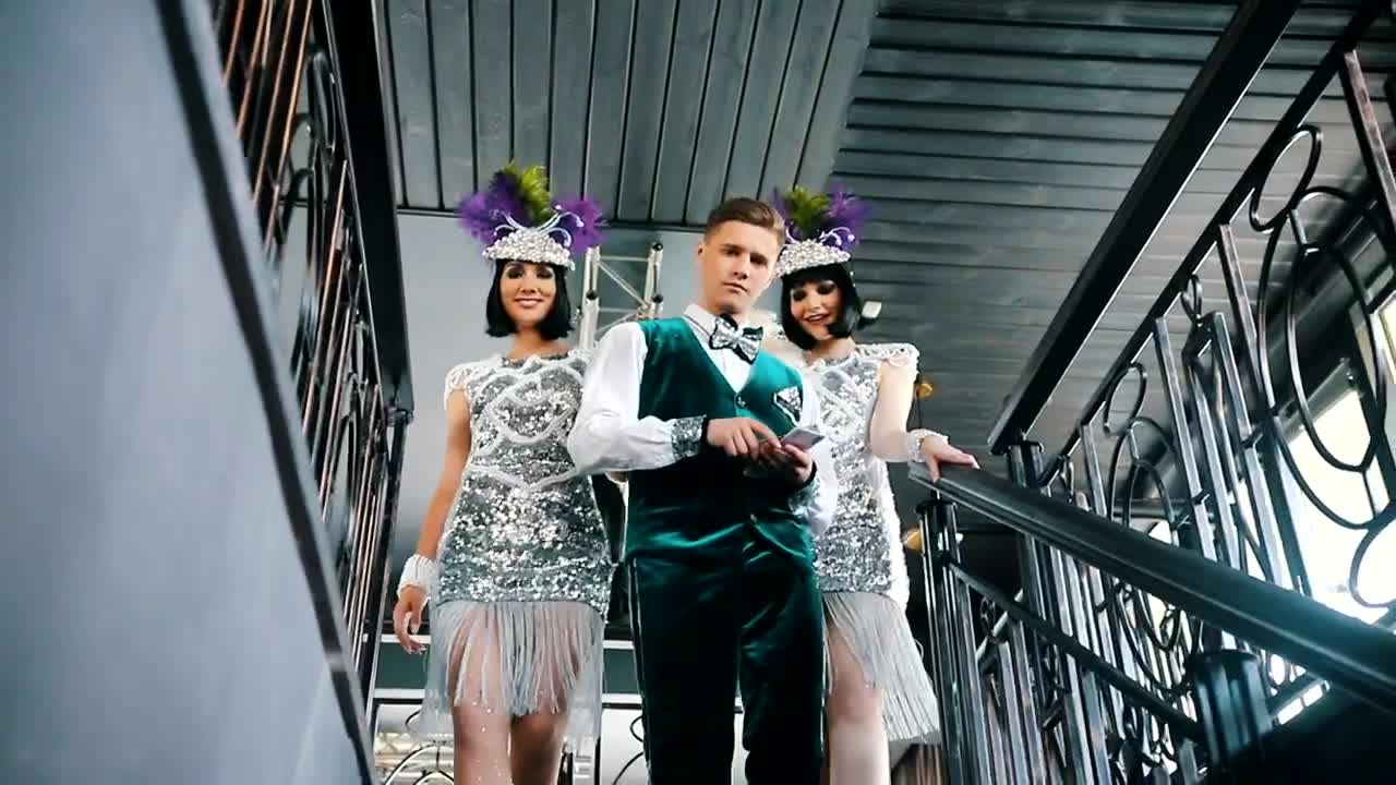 Stock Video Man Throwing Bills With A Couple Of Female Dancer Animated Wallpaper