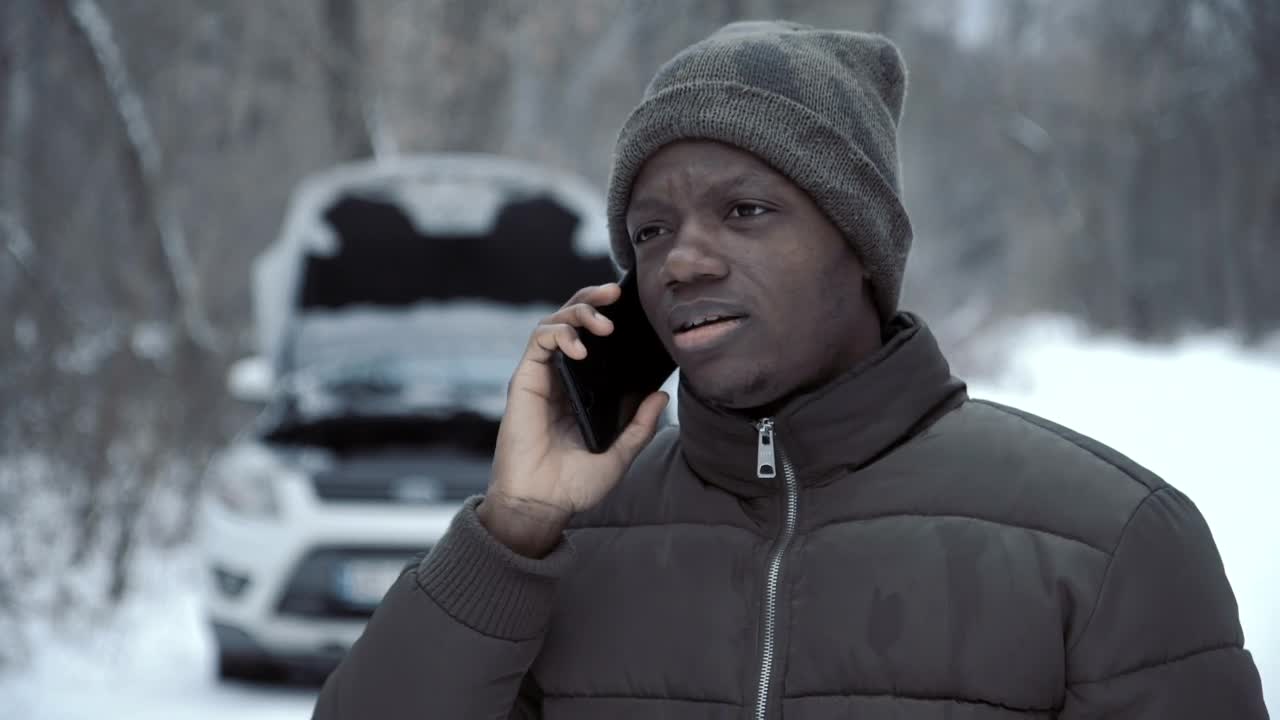 Stock Video Man Talking With Helpline About Broken Ca Animated Wallpaper