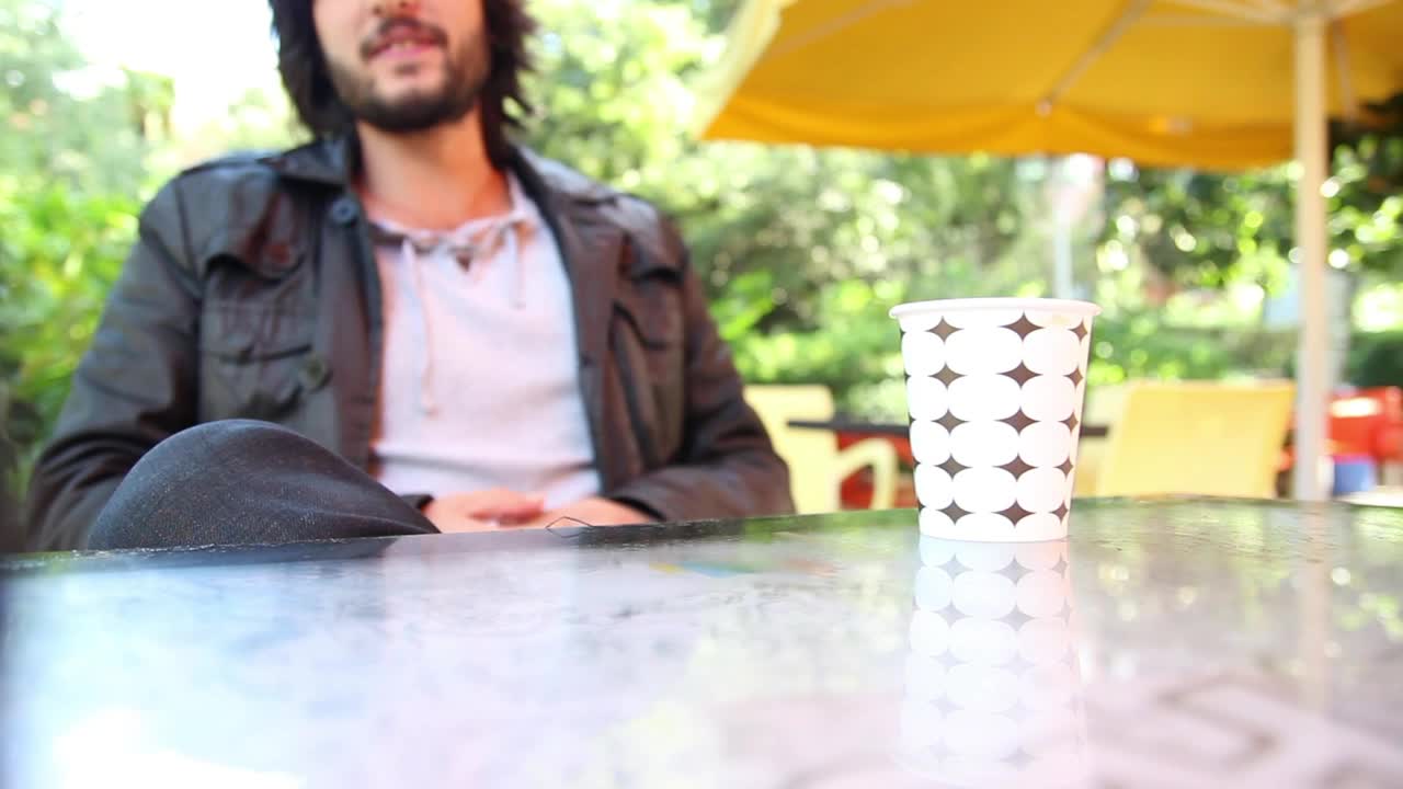 Stock Video Man Talking Drinking Coffee Outsid Animated Wallpaper