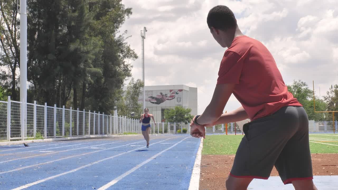 Stock Video Man Taking Time To A Girl Runnin Animated Wallpaper