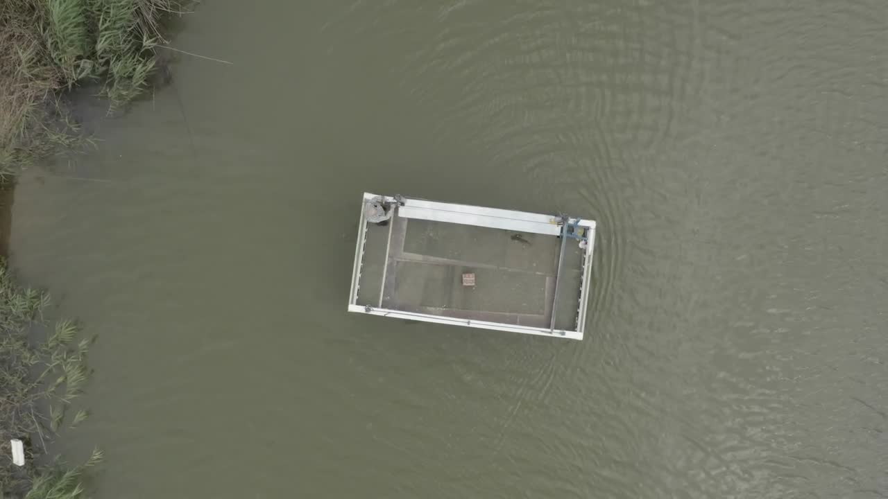 Stock Video Man Taking A Raft Across A Rive Animated Wallpaper