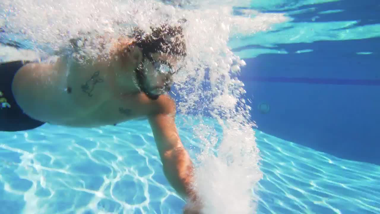 Stock Video Man Swimming In A Poo Animated Wallpaper