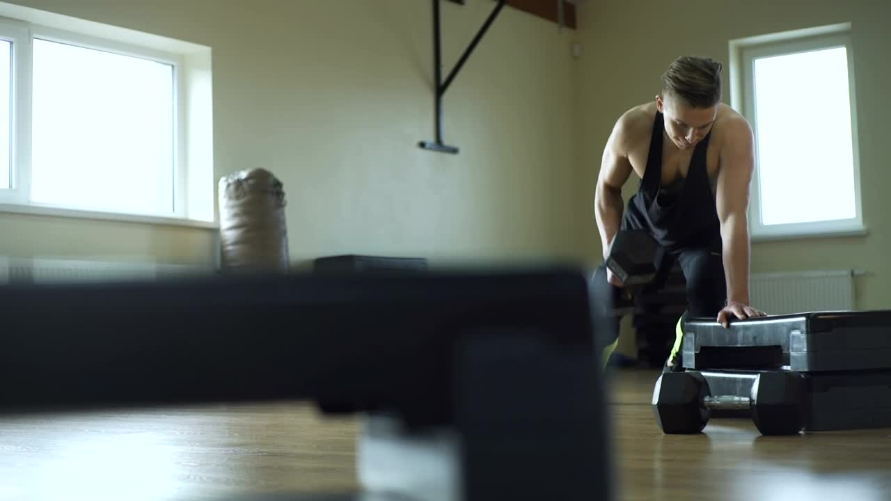 Stock Video Man Suffers An Injury During Workou Animated Wallpaper