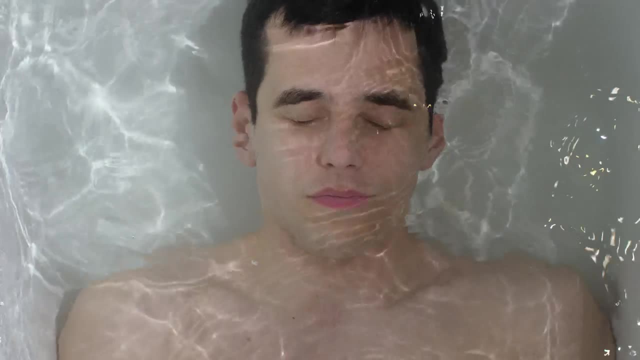 Stock Video Man Submerged In A Bathtub Top Sho Animated Wallpaper