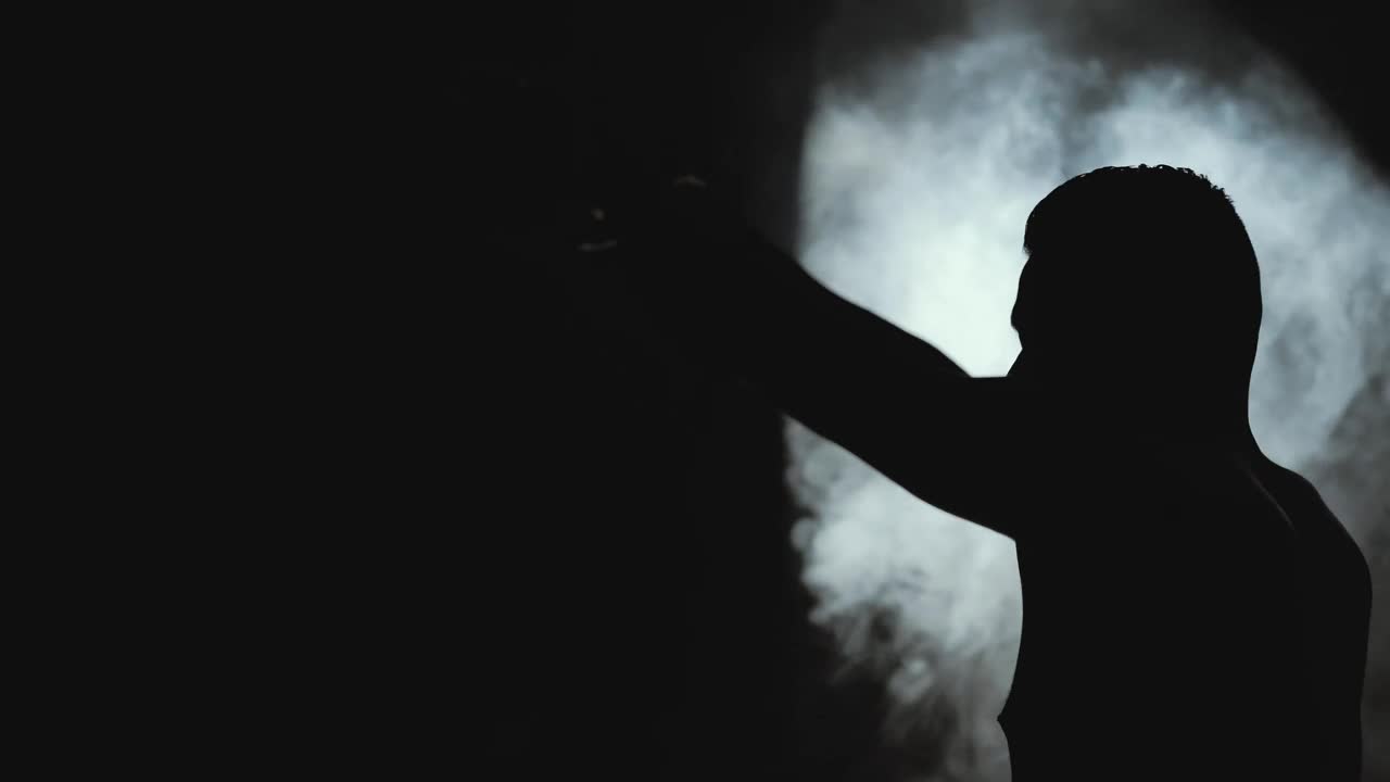 Stock Video Man Stretching In The Dark And Smok Animated Wallpaper