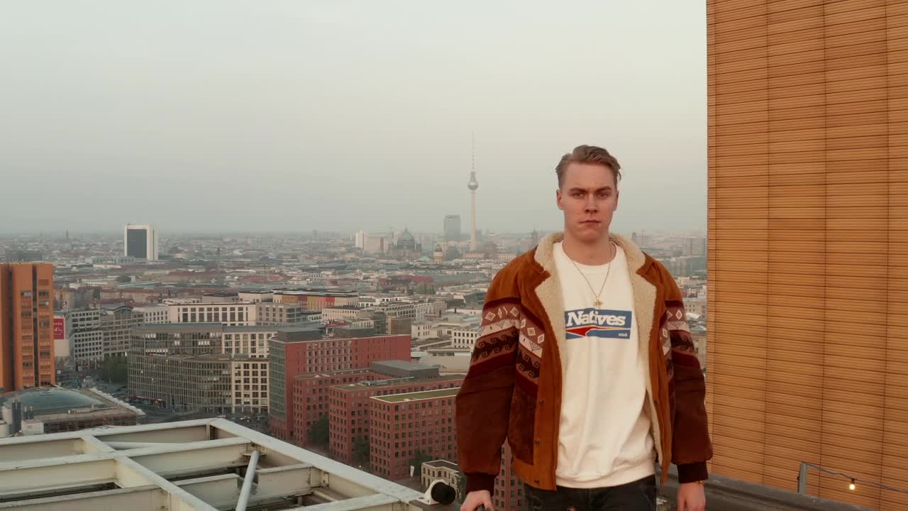 Stock Video Man Standing On The Edge Of The Roofto Animated Wallpaper