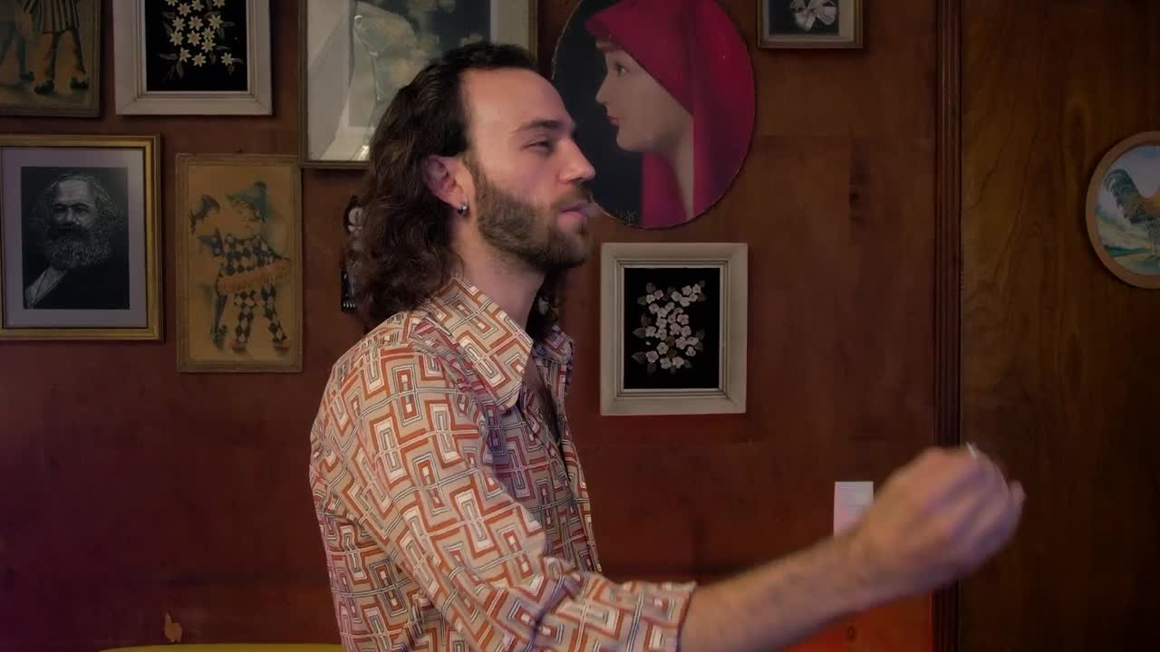 Stock Video Man Smoking A Cigarette And Looking At The Camer Animated Wallpaper