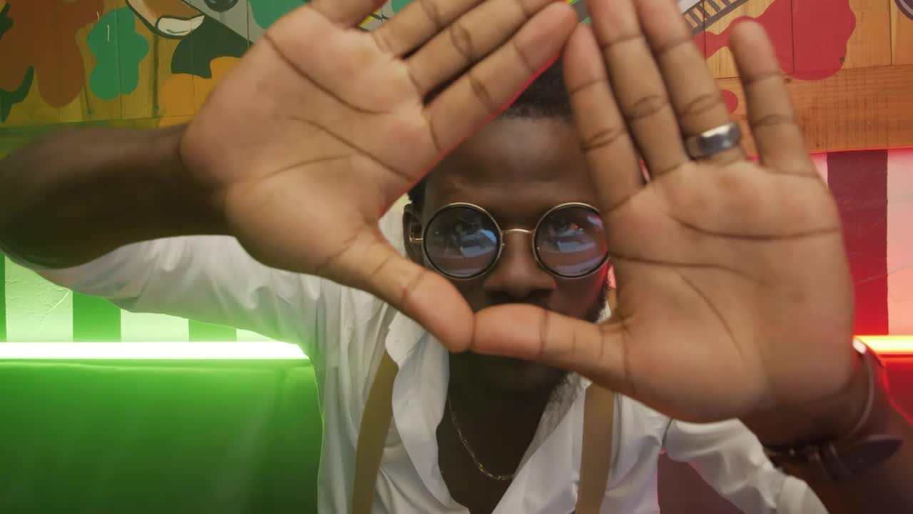 Stock Video Man Smiling And Dancing With His Hand Animated Wallpaper