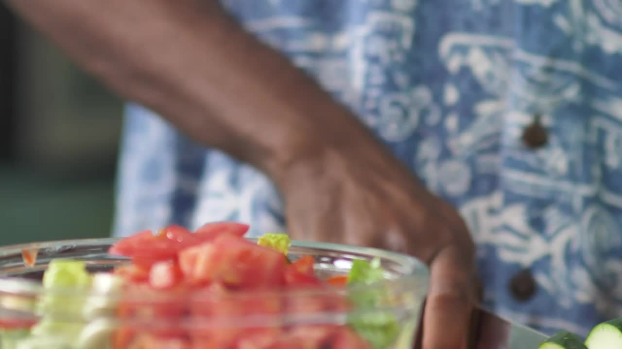 Stock Video Man Slicing Cucumber For Sala Animated Wallpaper