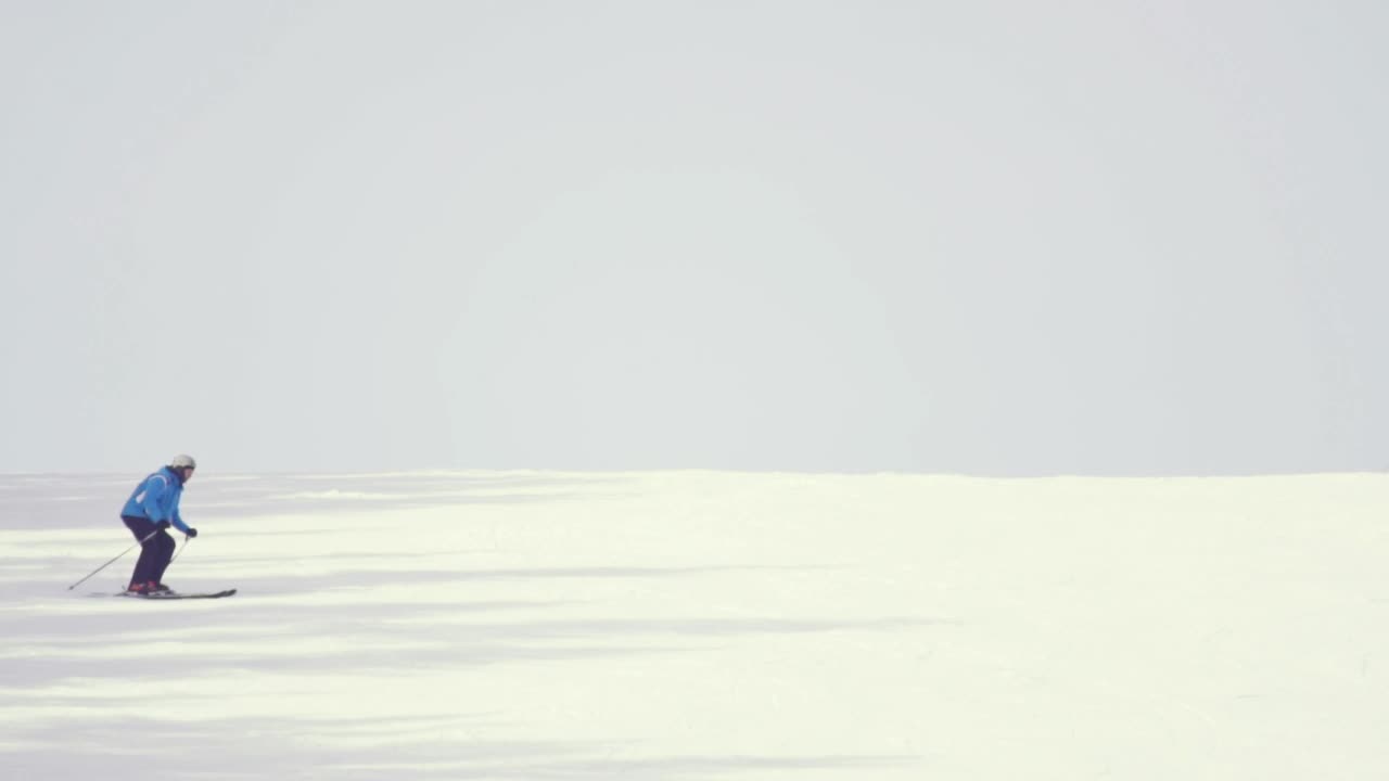 Stock Video Man Skiing In The Mountai Animated Wallpaper