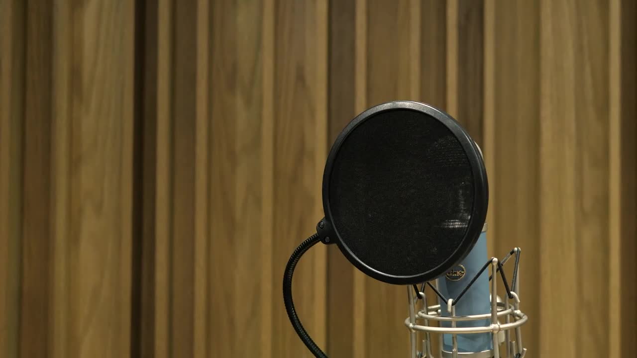 Stock Video Man Singing In A Recording Studi Animated Wallpaper