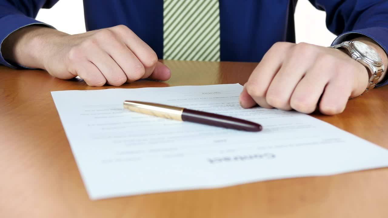 Stock Video Man Signing A Contract With Pe Animated Wallpaper