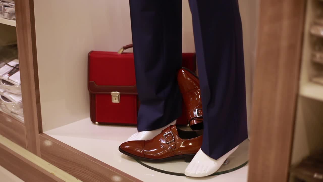 Stock Video Man Shopping Shoes At A Stor Animated Wallpaper