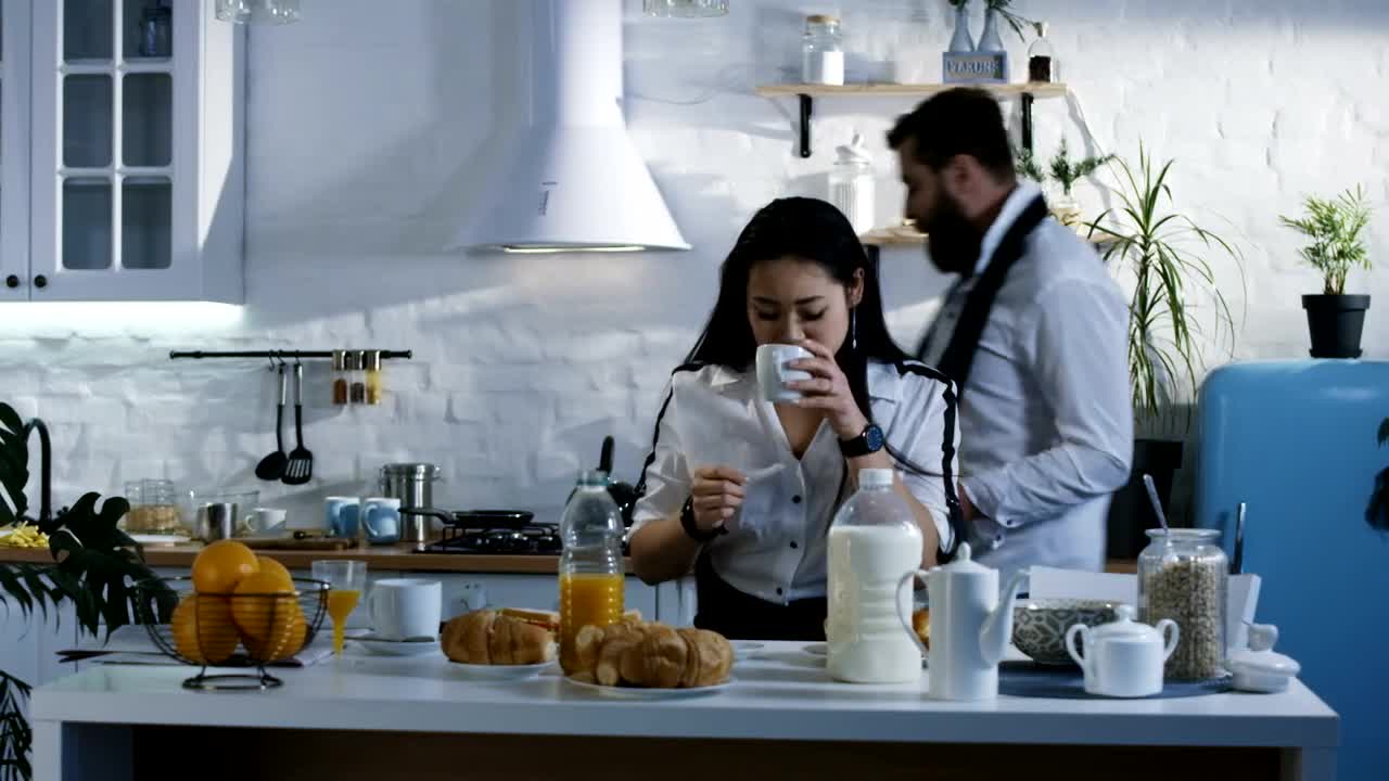 Stock Video Man Sharing The Good News During Breakfas Animated Wallpaper