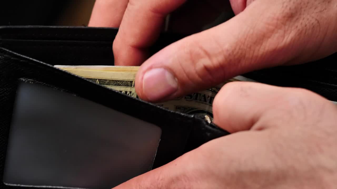 Stock Video Man Searching For A Banknote In His Wallet Close U Animated Wallpaper