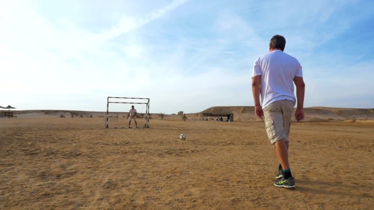 Stock Video Man Scoring A Goal Against His So Animated Wallpaper