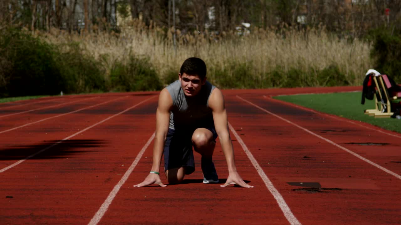 Stock Video Man Running Down A Trac Animated Wallpaper