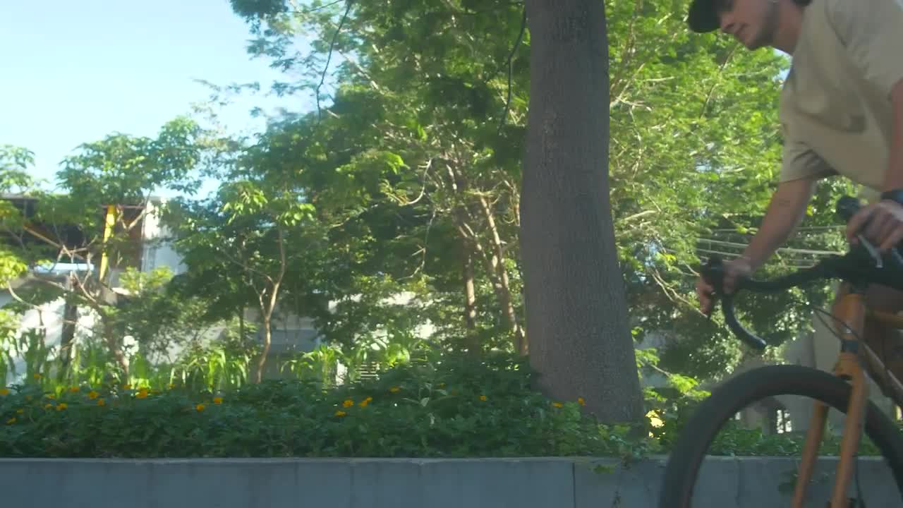 Stock Video Man Riding A Bicycle In A Par Animated Wallpaper