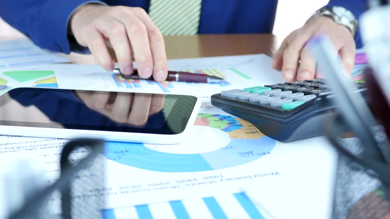 Stock Video Man Reviewing And Rectifying Graph Animated Wallpaper