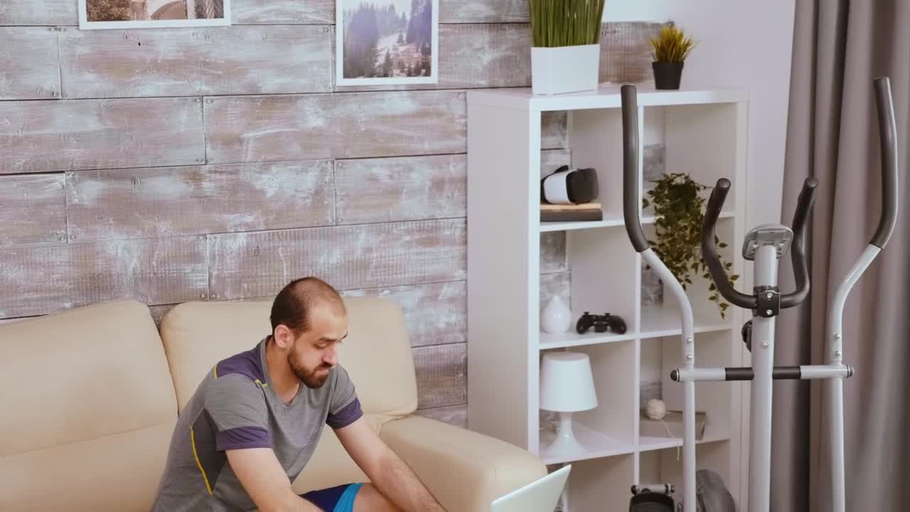 Stock Video Man Researching A Workou Animated Wallpaper