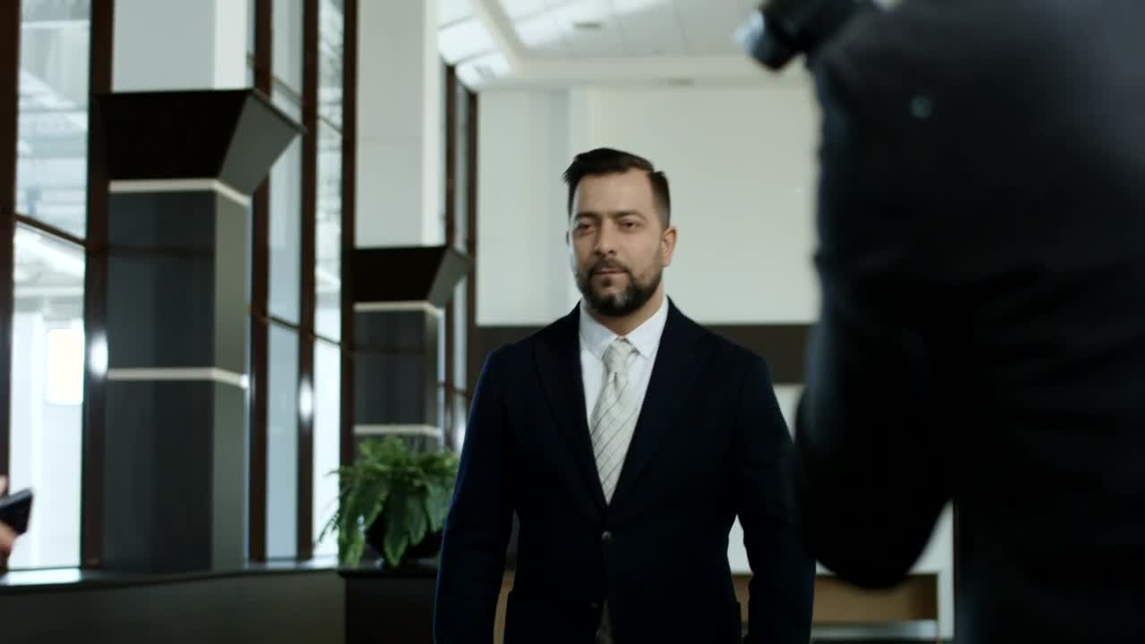 Stock Video Man Refusing Interviews From The Reporter Animated Wallpaper