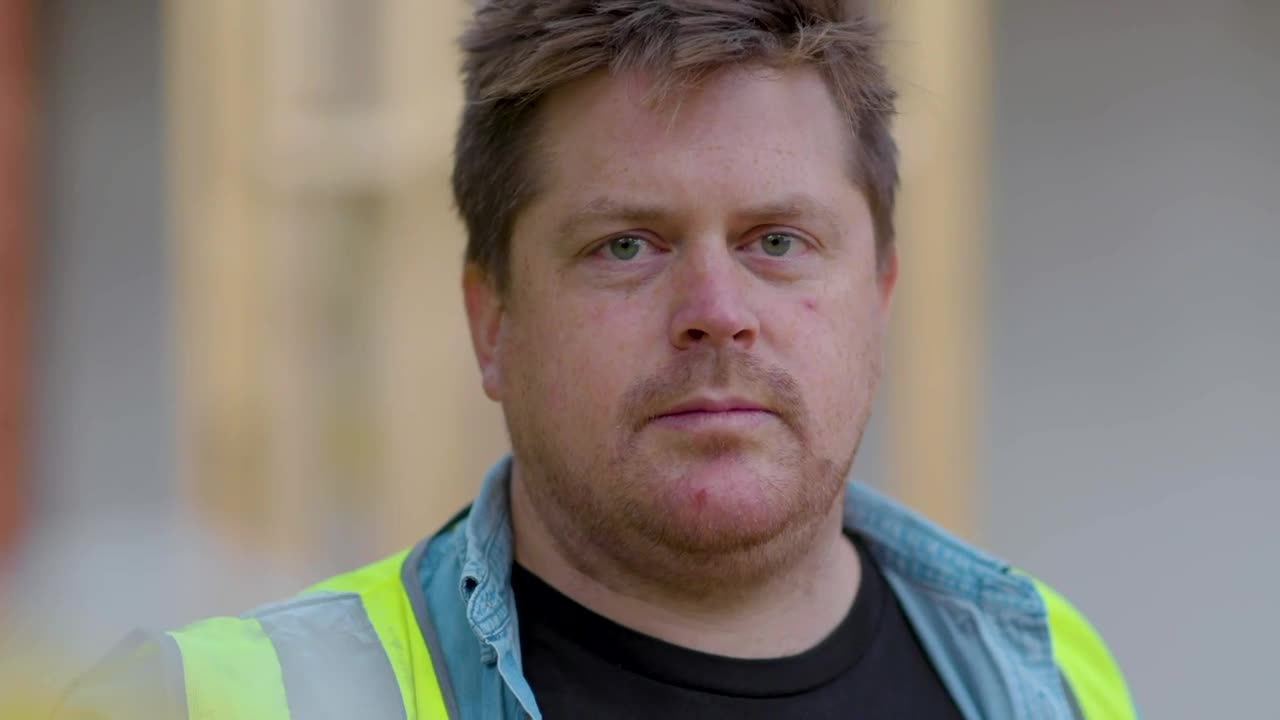 Stock Video Man Puts On Hard Ha Animated Wallpaper