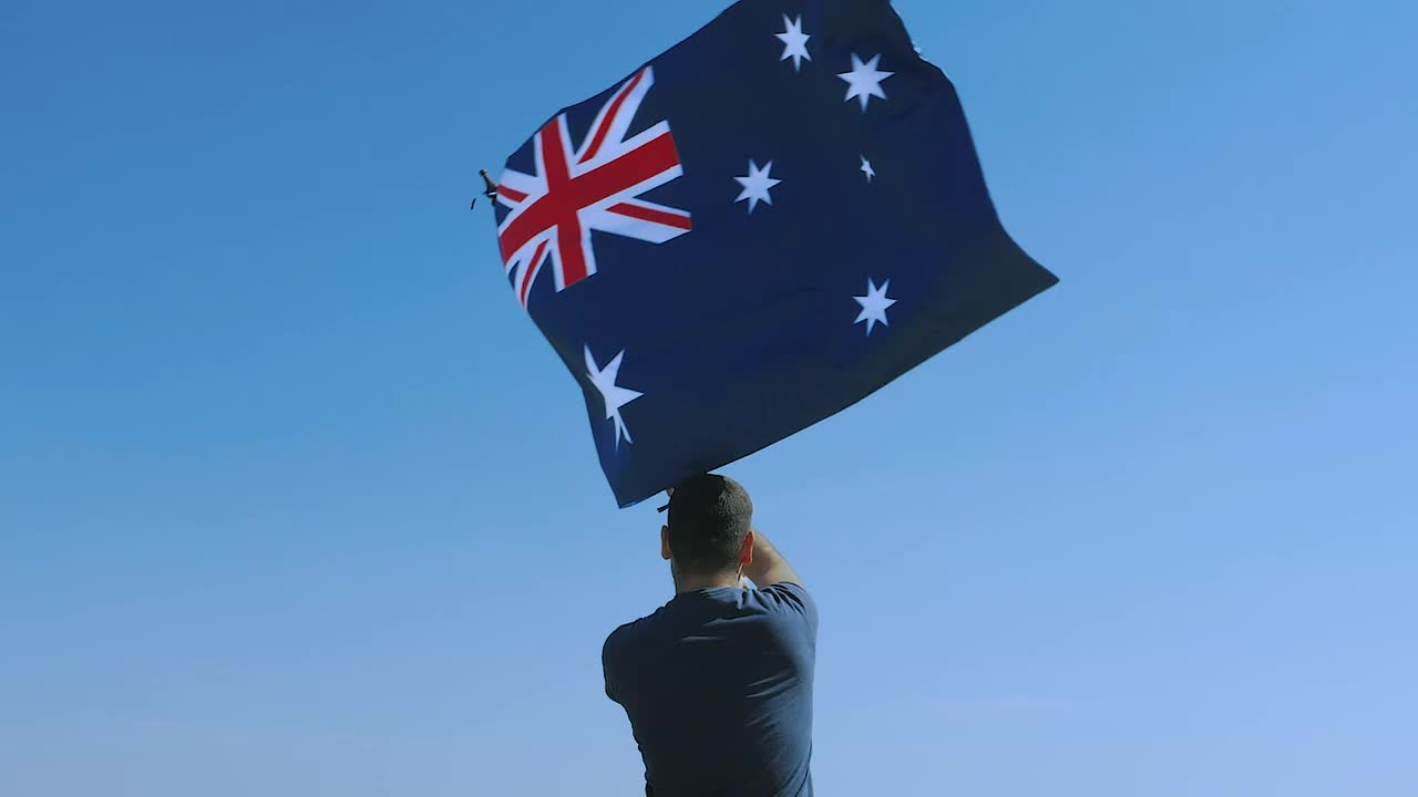 Stock Video Man Proudly Waving The Australian Fla Animated Wallpaper