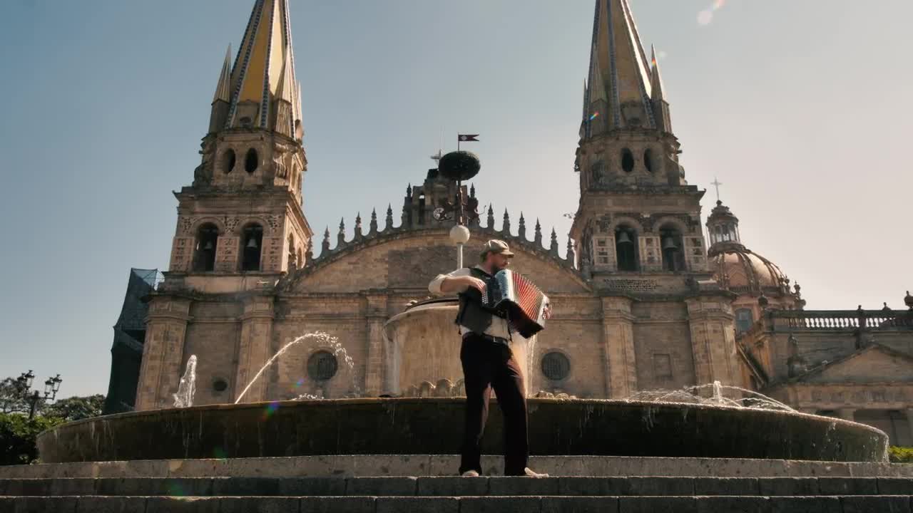 Stock Video Man Plays An Accordion In Front Of A Fountai Animated Wallpaper