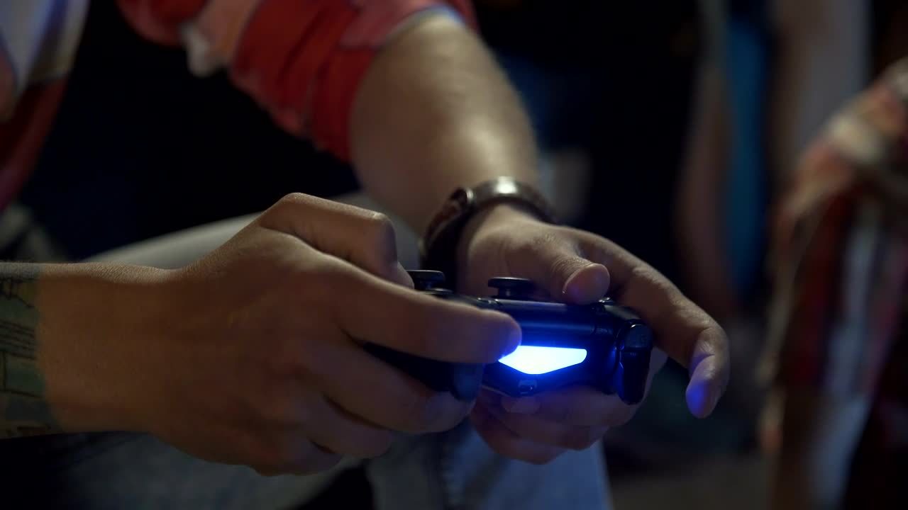 Stock Video Man Playing Video Games With A Controlle Animated Wallpaper