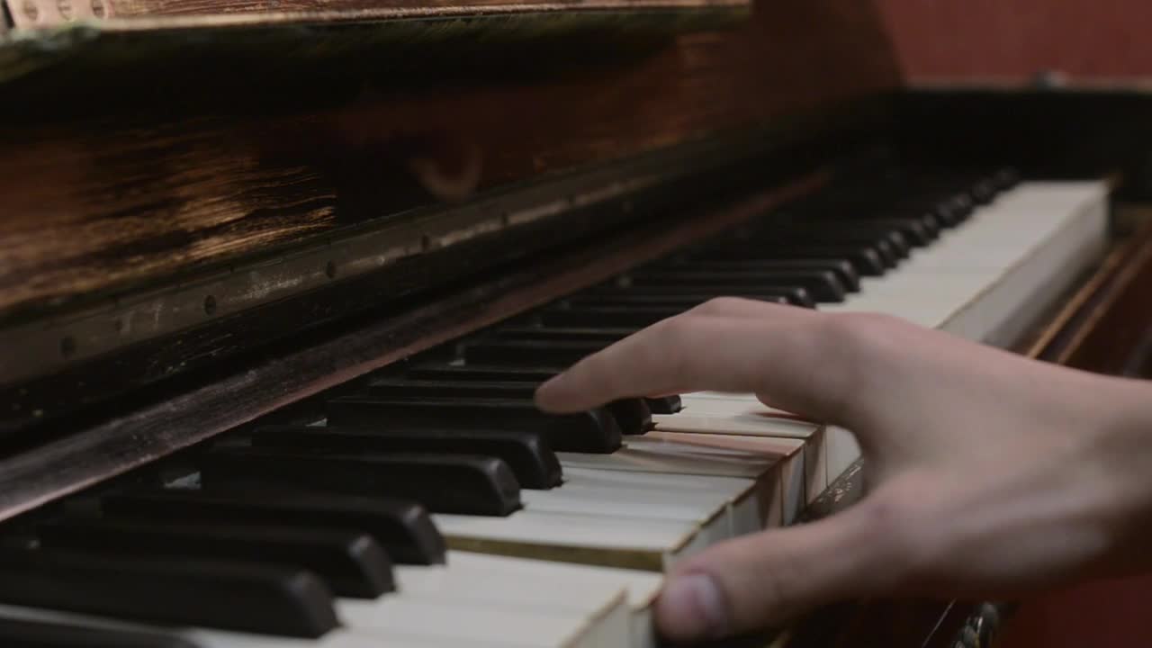 Stock Video Man Playing On An Old Pian Animated Wallpaper