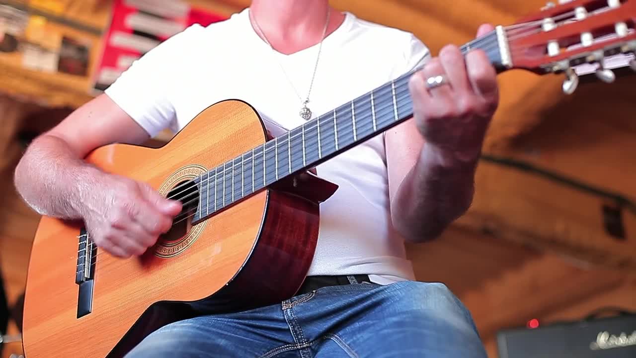 Stock Video Man Playing Acoustic Guita Animated Wallpaper