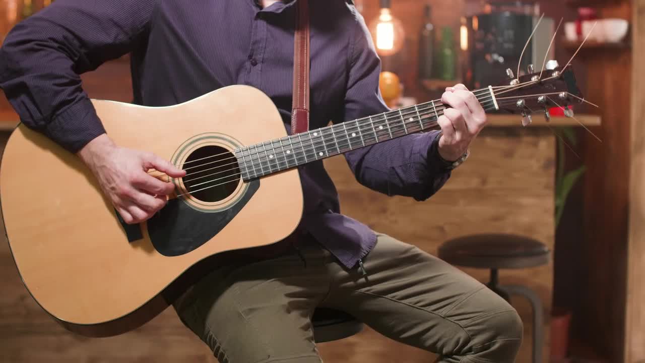 Stock Video Man Playing A Guitar In A Ba Animated Wallpaper