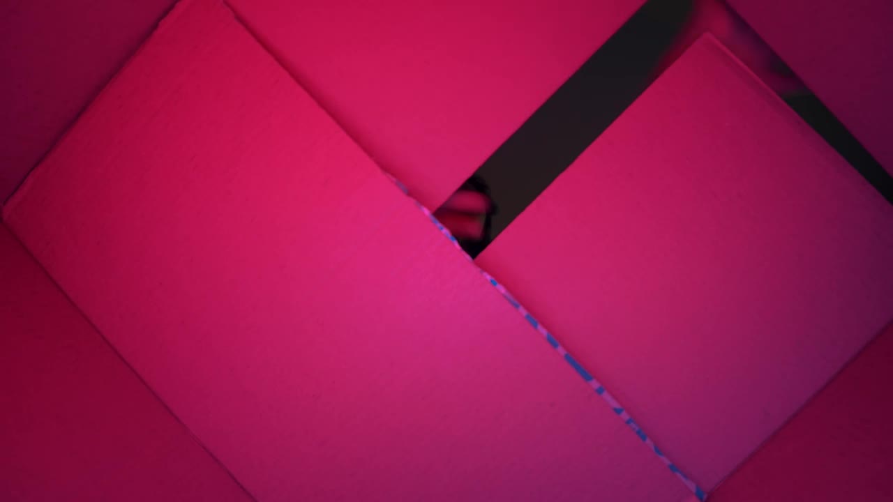 Stock Video Man Opening A Box Gets Angry About The Conten Animated Wallpaper