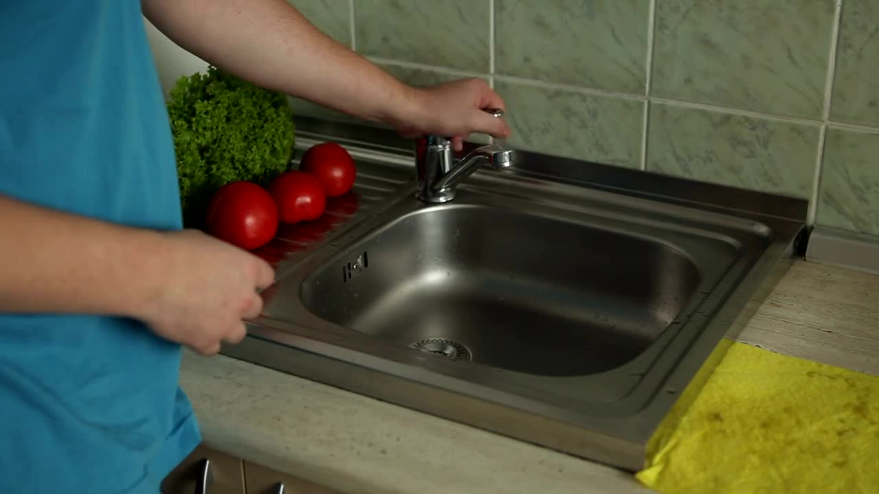 Stock Video Man On Diet Washing Vegetables In Sin Animated Wallpaper