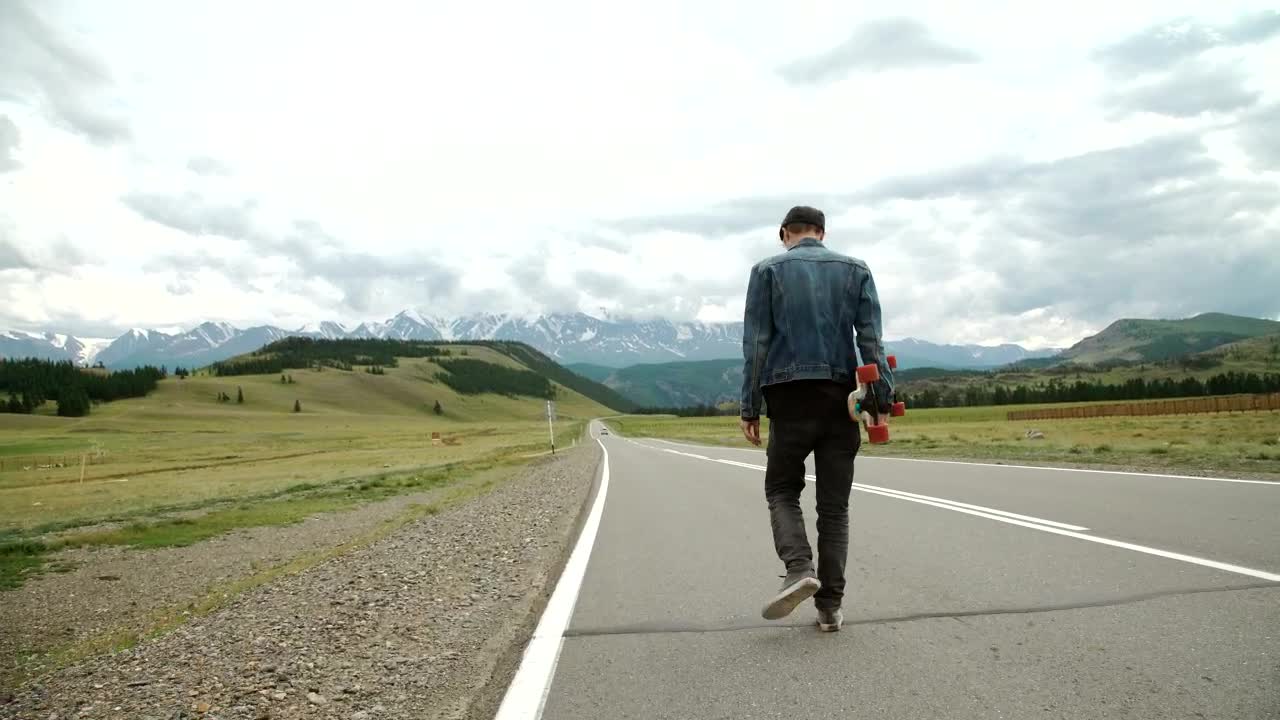 Stock Video Man On A Longboard On The Roa Animated Wallpaper