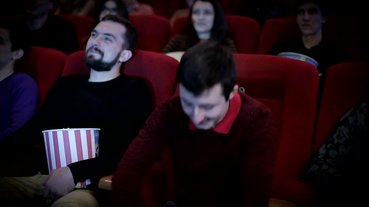 Stock Video Man Making Movie Piracy In Cinem Animated Wallpaper