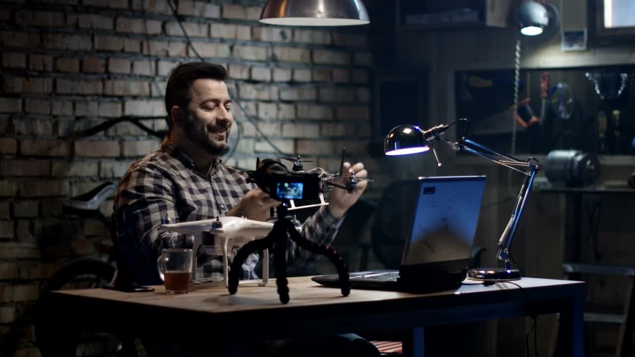 Stock Video Man Making A Drone Tutoria Animated Wallpaper