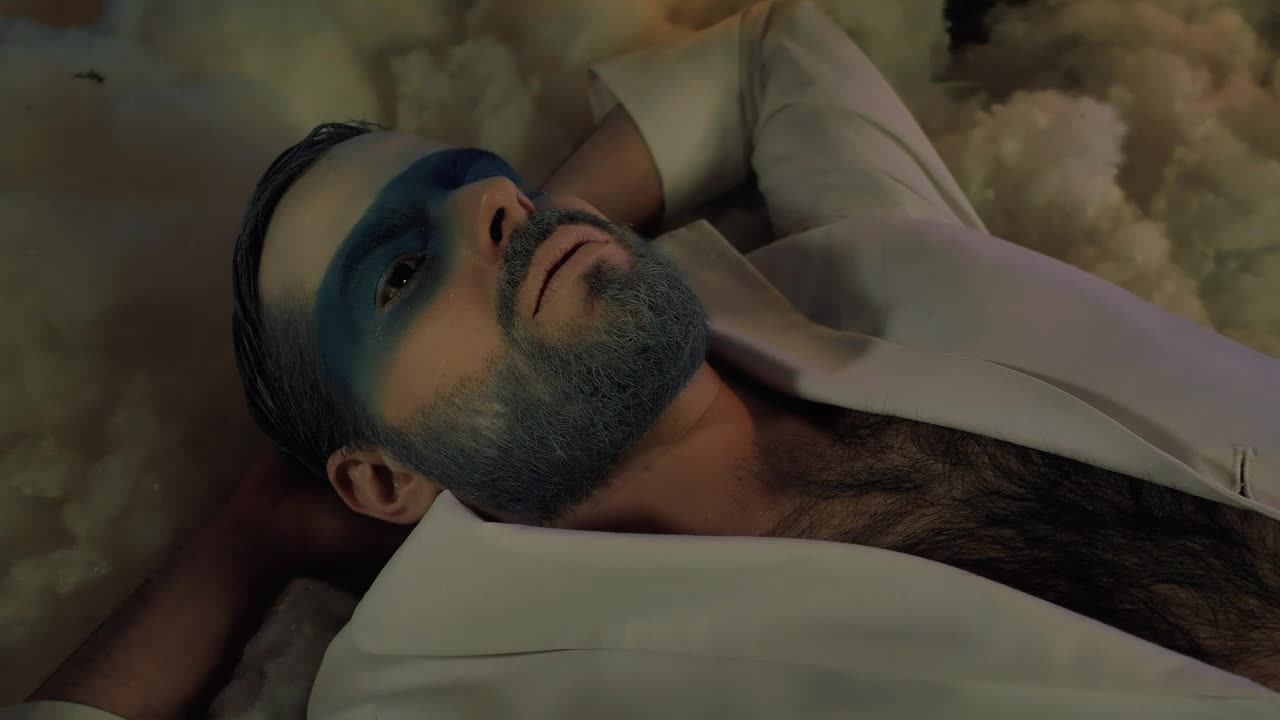 Stock Video Man Lying Down Cold Toned Makeup On Christma Animated Wallpaper