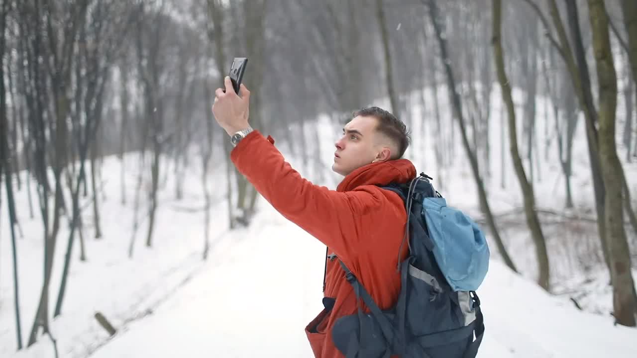 Stock Video Man Lost In Forest Looking For Cell Signa Animated Wallpaper