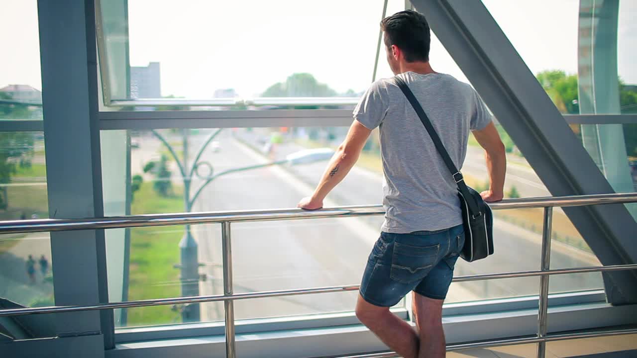 Stock Video Man Looking From A Pedestrian Bridg Animated Wallpaper