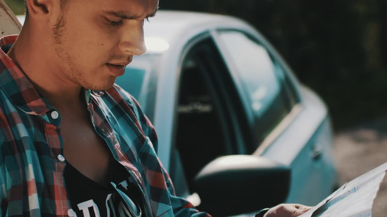 Stock Video Man Looking At A Map By His Broken Ca Animated Wallpaper