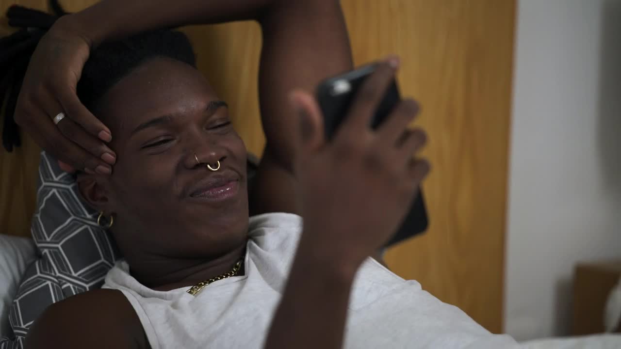 Stock Video Man Laughing Out Loud At His Cell Phon Animated Wallpaper