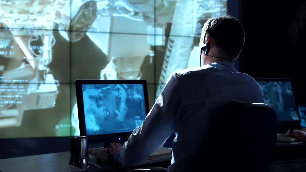 Stock Video Man In The Space Station Mission Contro Animated Wallpaper