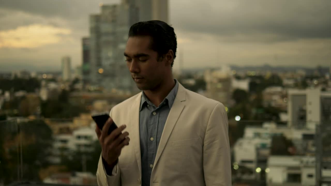 Stock Video Man In Suit Making A Phone Call Outsid Animated Wallpaper