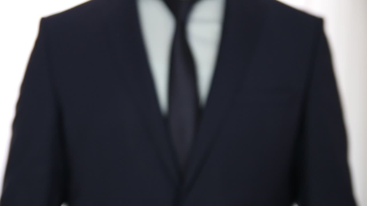 Stock Video Man In Suit Giving A Set Of Key Animated Wallpaper