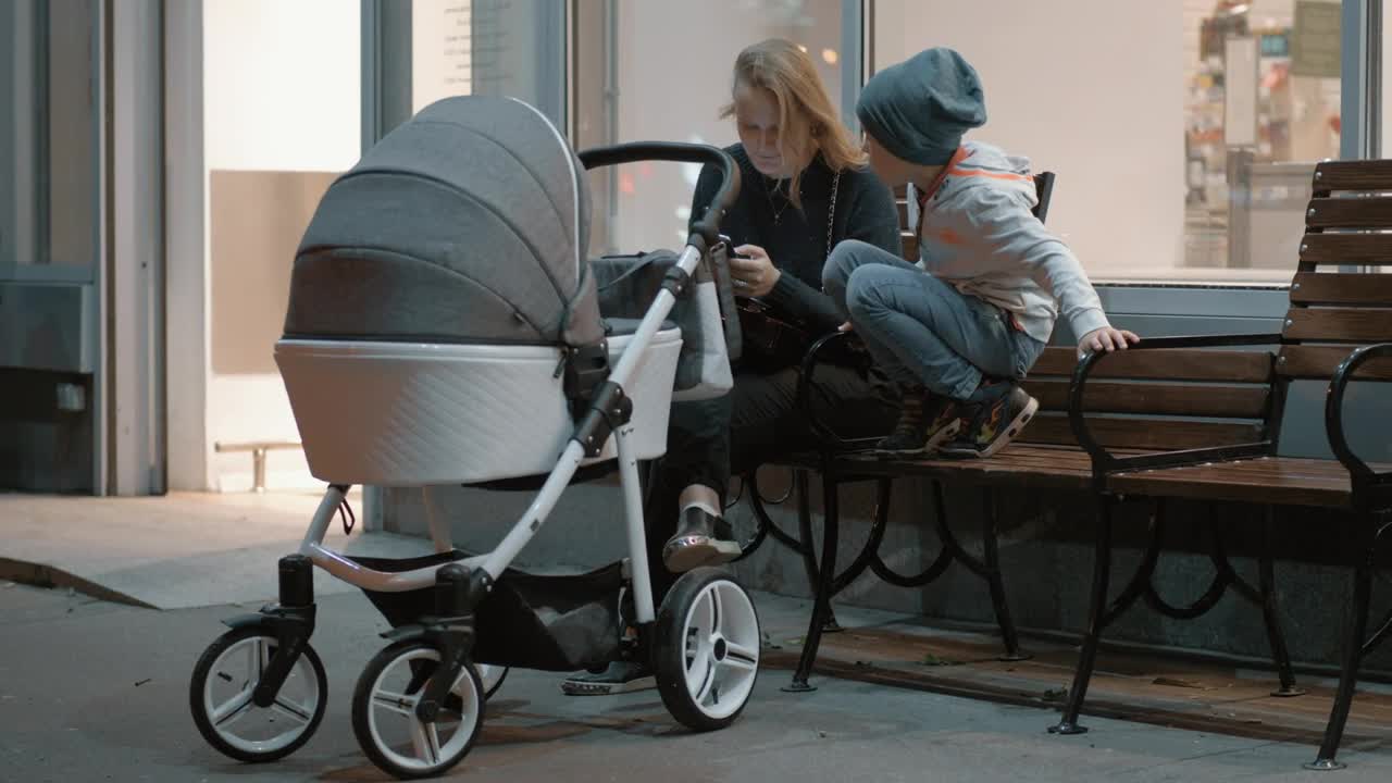 Stock Video Mother With Her Two Young Kids Live Wallpaper